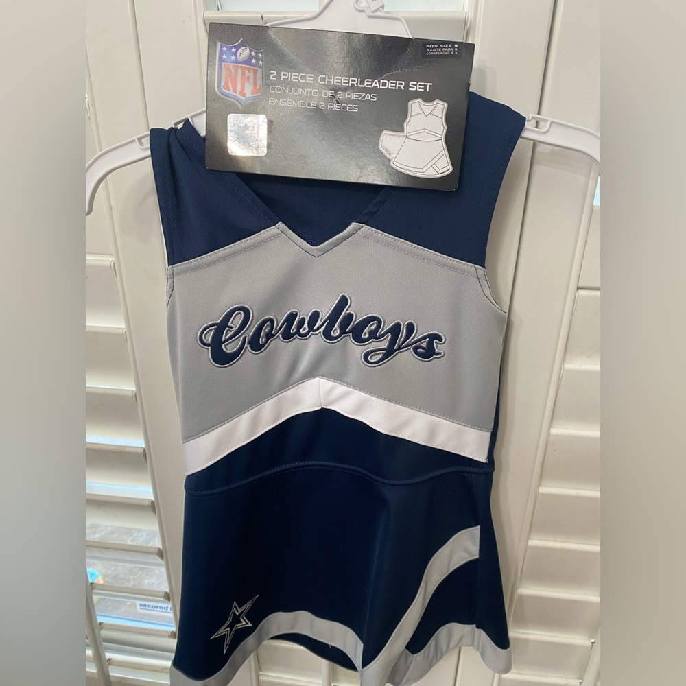 NWT. NFL licensed Dallas Cowboys Cheer Captain dress. Size 4